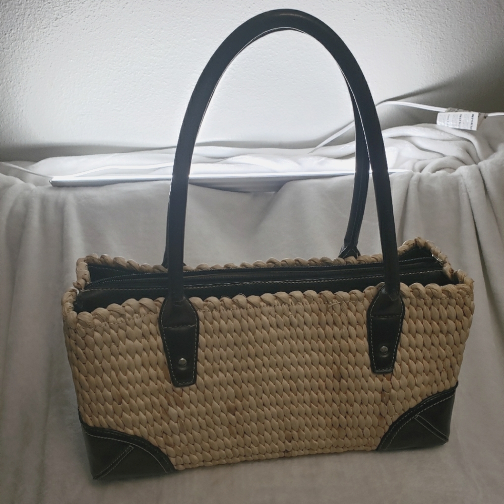 Wicker and black purse summer spring